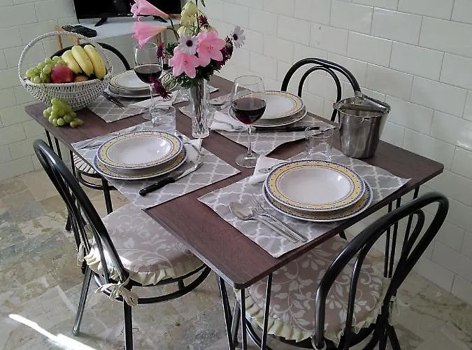 Da Angelo E Maria Caldura *